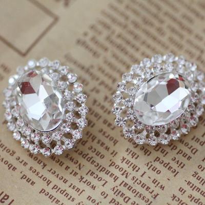 China Viable Oval Shape Crystal Clear Glass Rhinestone Buttons for Coat Dress Decoration for sale