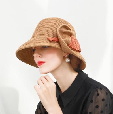 China 2018 Hot Selling Character Raffia Straw Bucket Hat Custom Simple Sun Hat Sun Hat With Bowknot Ribbon for sale