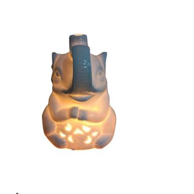 China Germany Hot Sale Popular Ceramic Candle Heater Portable White Gray Perfume Orange Jasmine Electric Wax Melt Burner for sale