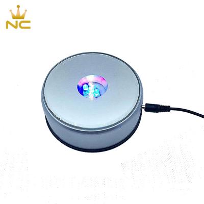 China 90MM China USB Battery Operated 3D Rotating Acrylic Adapter And 100MM Round Crystal Led Light Base for sale