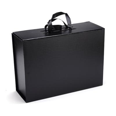 China Recycled Luxury Matte Black Materials Lid Cardboard Handbag Packaging Magnetic Flap Gift Box for sale