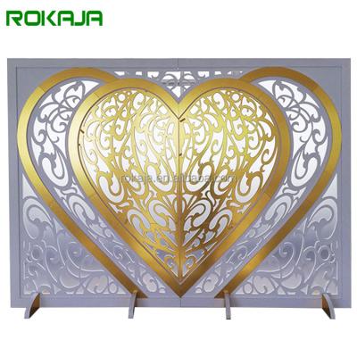 China Heart design wedding stage layout background event party luxury love scene wedding gold decoration background wall for sale