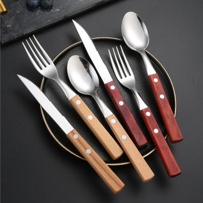 China Eco-Friendly Sustainable 304 Stainless Steel Handle Cutlery Set Wooden Spoon Knife and Forking Stainless Steel Silverware Flatware Set for sale