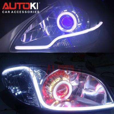 China Autoki 600MM day time running light dual color roller coaster led flexible drl, flexible led daytime running light drl for sale