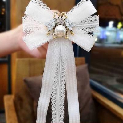 China Fashionable French Romantic White Exquisite Flower Brooch Collar All-match Bow Tie Lace Bee Lace Bow Ribbon Ribbon Female Elegant for sale