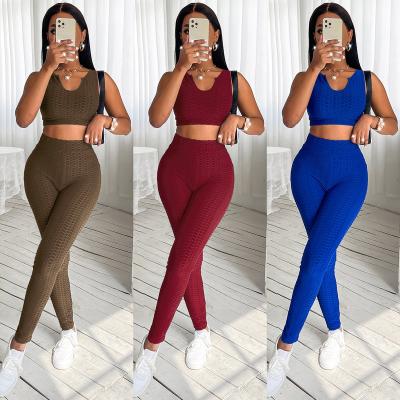 China Custom Logo Women's Sports Casual QUICK DRY Two Piece Pant Sets 2 Piece Joggers Crop Hollow Out Sleeveless Leggings Sets For Women for sale