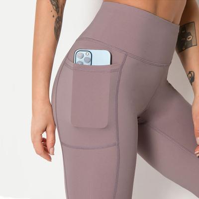 China Hot Selling Breathable Women Gym Tights With High Waisted Nylon Workout Pocket Delivery Ladies Yoga Gaiters High Waisted Tights for sale