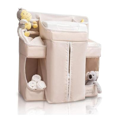 China Hanging Organizer Caddy, Multi-pockets Baby Diaper WRAPPING BAG Diaper Caddy Attaches to Crib or Changing Table for sale