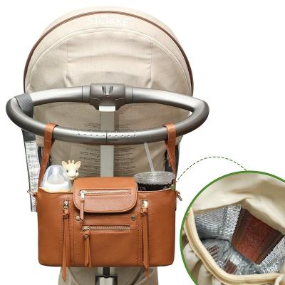 China Baby Accessory Carriage Water Resistant Stroller Bag Brown Leather Stroller Organizer With Insulated Cup Holder for sale