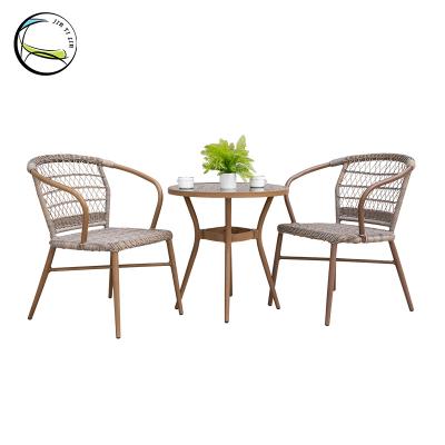 China UV-resistant whole rattan backyard sale outdoor garden chair with tempered glass table top for sale