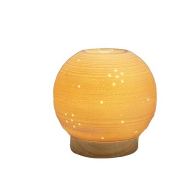 China Morden Customized Ceramic Wood Burner Lamp Foot Wax Ball Melter Ceramic Fragrance Lamp for sale