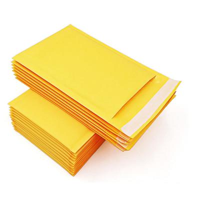 China High impact resistance hardness yellow kraft paper bubble mailer printed logo packaging mailers envelopes mailing buble bag for sale