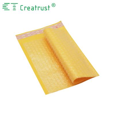 China Waterproof Eco-Friendly Non-Toxic 4x8 Inches Kraft Bubble Mailers Padded Envelopes Made Of Strong Kraft Paper And Bubble Yellow for sale