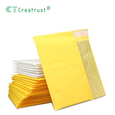 China Shock Resistance Air Bubble Cushioned Padded Envelopes Kraft Bubble Bag Custom Mailing Bags for sale