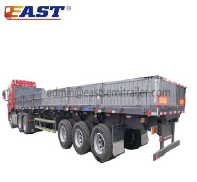 China Dump Truck Trailer 60ton 80ton Side Tipper Trailer Dump Truck East Side Semi Trailer With Slant Angle Sideboard for sale