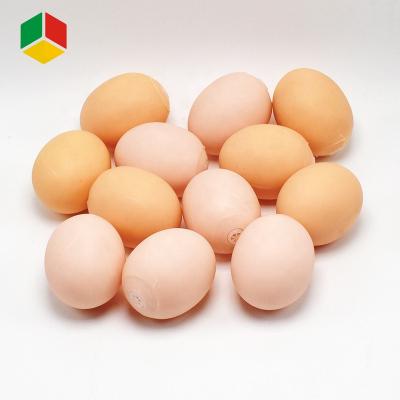 China Realistic Egg Toy QS Toys Promotional Bouncy Ball Dog Toy Rubber Bouncing Small Pet Realistic Egg For Easter Toy for sale