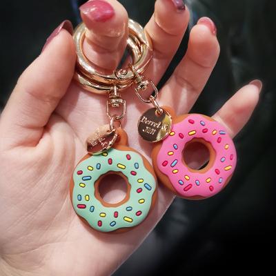 China Shockproof Cute Donut Protective Case For Apple Airtag Silicone Anti-lost Protector Key Chain Holder for sale