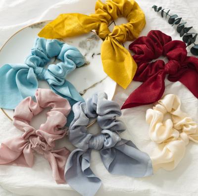 China Popular Wholesale Head Ring Silk Satin Hair Scrunchies Solid Color Rabbit Ear Scrunchies For Lady for sale