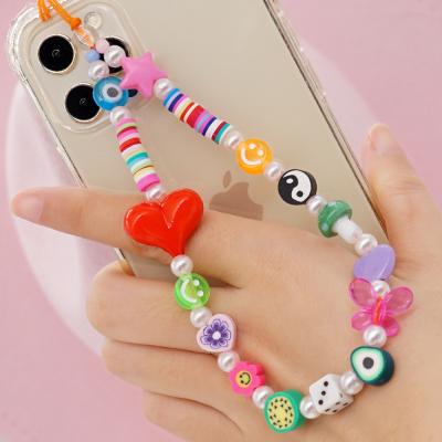 China Ship Phone Jewelry Wholesale Bohemia Acrylic Read Decoration Beads Wrist Charm Colorful Phone Chain For Women Mobile Accessories for sale