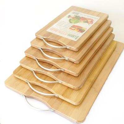 China Sustainable Wholesale Wood Cutting Plate Natural Bamboo Cutting Board With Metal Handle for sale