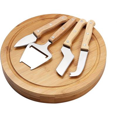 China Sustainable Hot Sale Bamboo Cheese Board Set Round Vegetable And Fruit Cutting Board With Stainless Steel Knife 4 Piece Set for sale