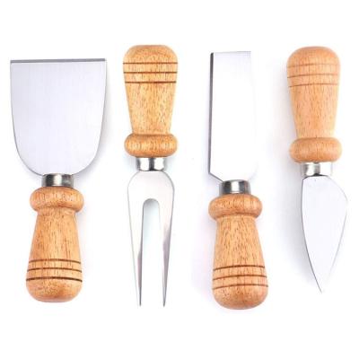 China Sustainable Kitchen Cheese Tools Stainless Steel Cheese Knives Set 4 Piece Cheese Slicer Set With Wooden Handle for sale