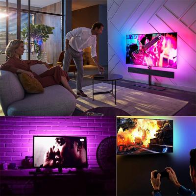 China 2022 40-65 inch LED TV Rise RGBIC Wi-Fi Ambient Alexa Google Voice Control Immersion 12V Theme Park/Home Backlight with 1080P Camera for sale