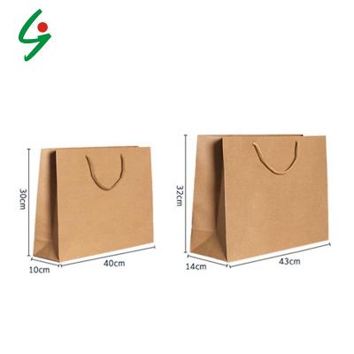 China Custom Printed LOGO Kraft Brown Paper Bag Recyclable With Handles for sale