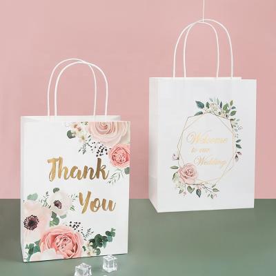 China Recyclable Custom Ins Fashion Wedding Celebration Printed Gift Shopping Bag With Handle Kraft Paper Bag for sale