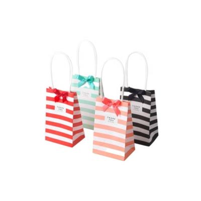 China Lovely Recyclable Small Stripe Color Candy Paper Tote Bag Korean Wholesale White Stain Portable Gift Bags Mini Portable Packaging Bags for sale