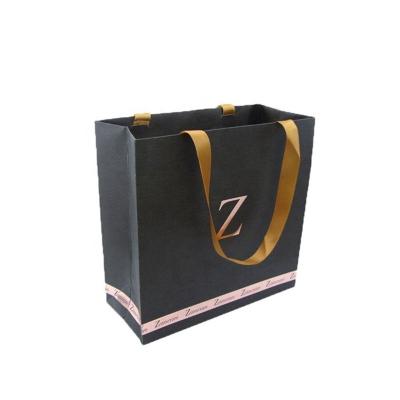 China Recyclable Luxury Ribbon Handle Boutique Shopping Packaging Customized Printed Tote Paper Gift Bags With Euro Logo for sale