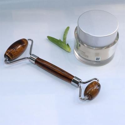 China Whitening Noctilucous Jade Faceroller Faceroller Detoxing Lifting Sculping Facial Massager Handheld Massager Tool for Face and Neck for sale