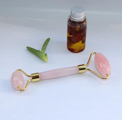 China Whitening Magic Facial Natural Massager Rose Quartz Beauty Roller Tool 100% Beauty Tool Face Lifting for sale