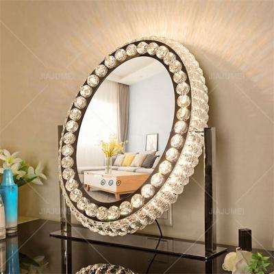 China Oval Shape Lighted Crystal Material Professional Makeup Mirror New Items With Lights for sale