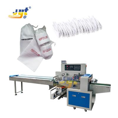 China Automatic Disposable Commodity Slipper Packing Machine Goods Packaging Machine Toiletries Packing Machine for sale