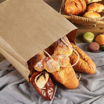 China Recycled materials wholesale price brown kraft paper bag with custom printing logo fast food coffee bread vegetable take away shopping paper bag for sale