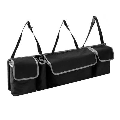 China Durable Car Hanging Back Seat Storage Organizer Hanging Folding Boot Car Suv Backseat Hanging Storage Bag for sale