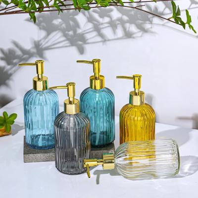 China Fashion 400ml Personal Care Soap Dispenser Vertical Stripes Glass Hand Soap Bottle With Gold Pump for sale