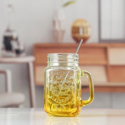 China Juice Drinking Wholesale 16oz Glass Mason Jar With Handle And Metal Lid for sale