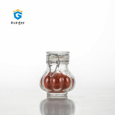 China Sustainable Pumpkin Shape Empty Spice Bottles With Kitchen Spice Clear Glass Jars for sale