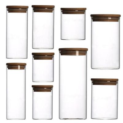 China Sustainable Bamboo Lid Glass Spice Jar Set And High Borosilicate Glass Container Bangs Airtight Seal Glass Jars In Kitchen for sale