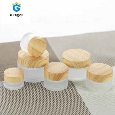 China Personal Care Product Hot Round 15g Frosted Wood Grain Cream Bottle Glass Plastic Screw Cap for sale