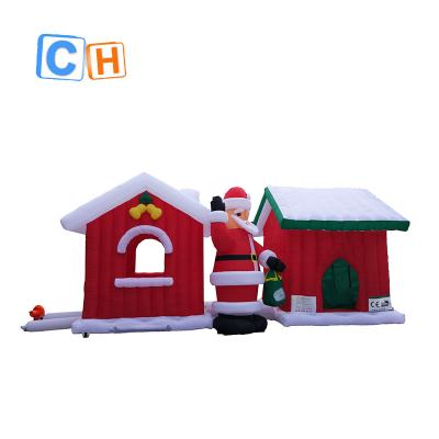 China Oxford Cloth Advertising Inflatable Christmas House And Inflatable Christmas Man Decoration For Christmas for sale