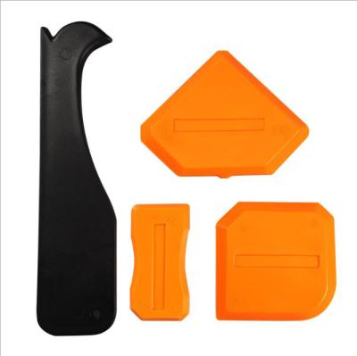 China Silica Gel Triangular Scraper Plastic Squeegee Aesthetic Seam Glue Applicator for sale