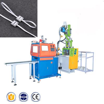 China VERTICAL Garment Shoes Logo String Lock Hang Tag Vertical Injection Molding Machine for sale