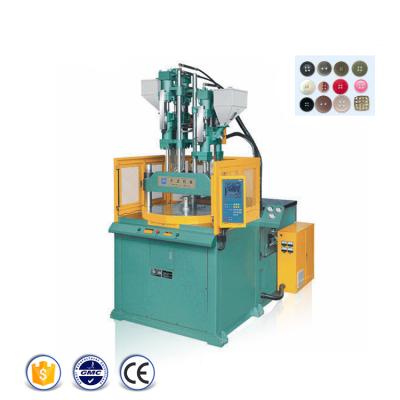 China VERTICAL Multi Color Garment Fabric Buttons Rotary Injection Molding Machine Price for sale