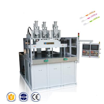 China VERTICAL Double Color Vertical Toothbrush Making Injection Molding Machine With Rotary Table for sale