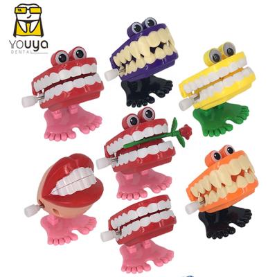 China Mini Toy Chattering Dental Wind Up Toy Walking Teeth Practical Joke for sale