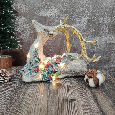 China Europe Home Decor Deer Figurine Christmas Elf Resin Reindeer Figurines With LED Lights for sale