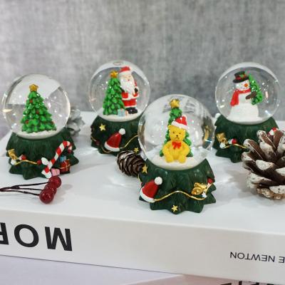 China Clear Promotion Giftts Christmas Decoration 4 Style Water Globe Resin Snow Globes for sale